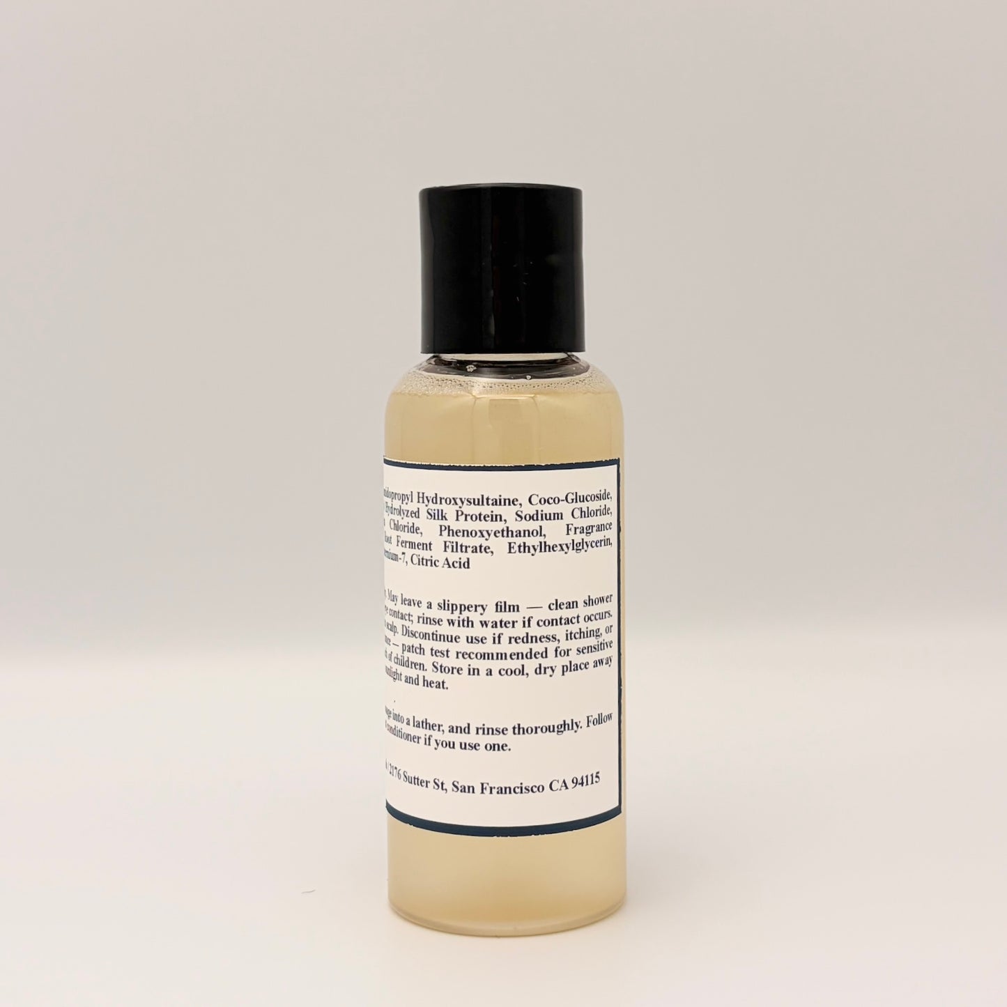 S-7 Daily Shampoo ingredient list close-up: sulfate-free formula with hydrolyzed silk protein