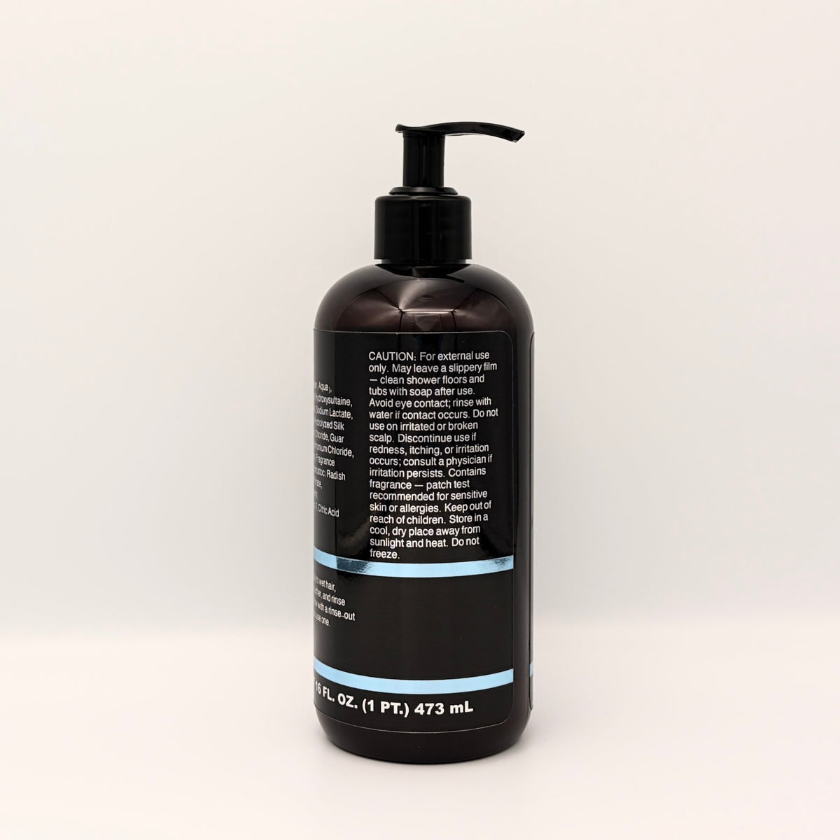 S-7 Daily Shampoo side panel showing the full caution statement and net contents, 16 fl. oz. (1 pt.) 473 mL