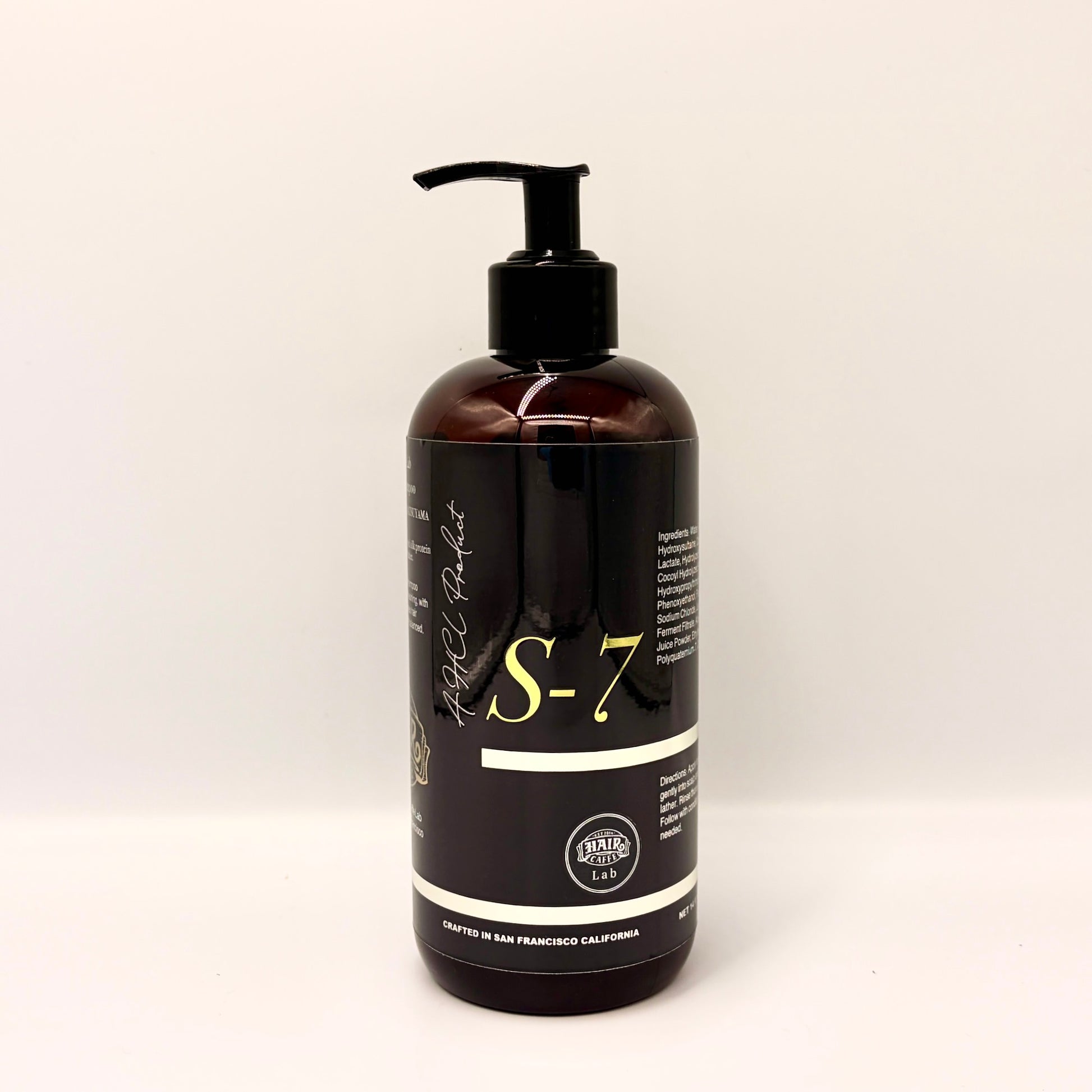 Hair Caffe Lab S-7 Daily Shampoo Standard Size, dark amber pump bottle with gold S-7 wordmark